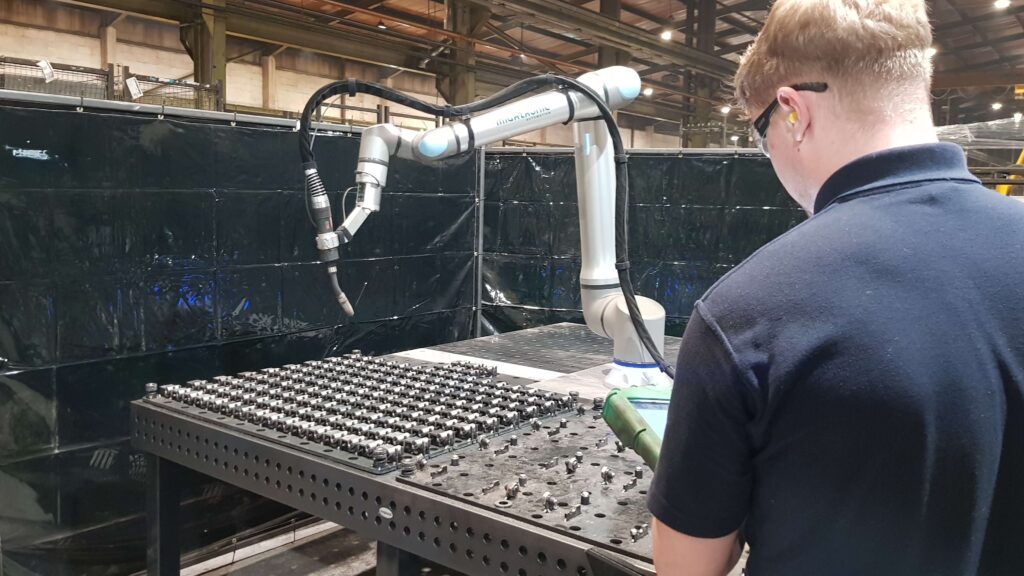 ADM_Pressings_Industrial_robot_welding ADM Pressings industrial robot welding investment
